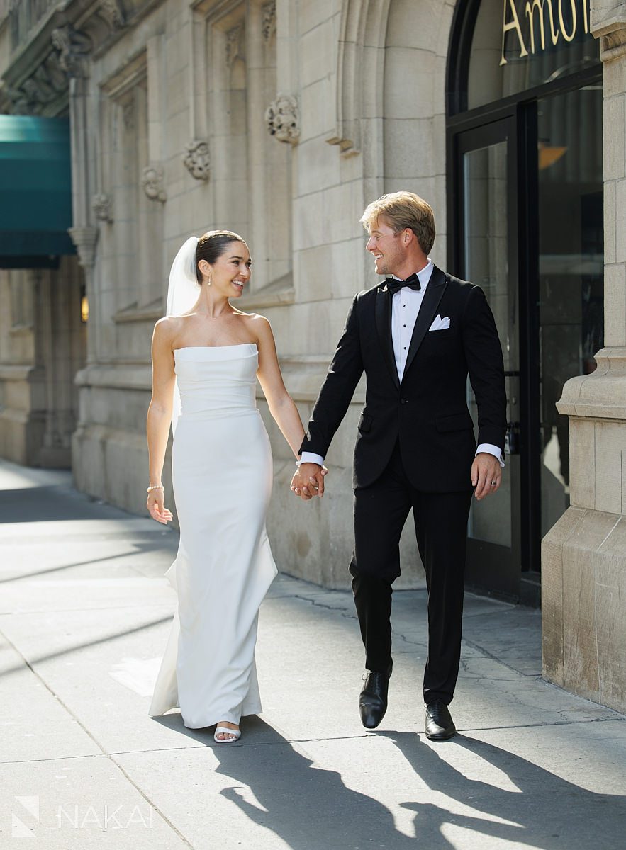 outside university club chicago wedding photo bride and groom