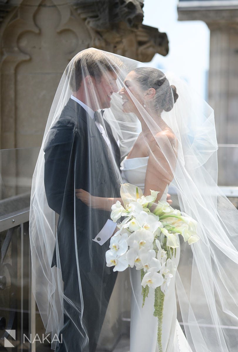 terrace university club chicago wedding photo couple under veil