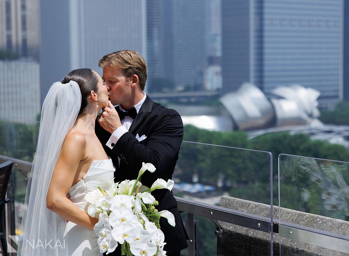 over looking millennium park university club chicago wedding photo on terrace