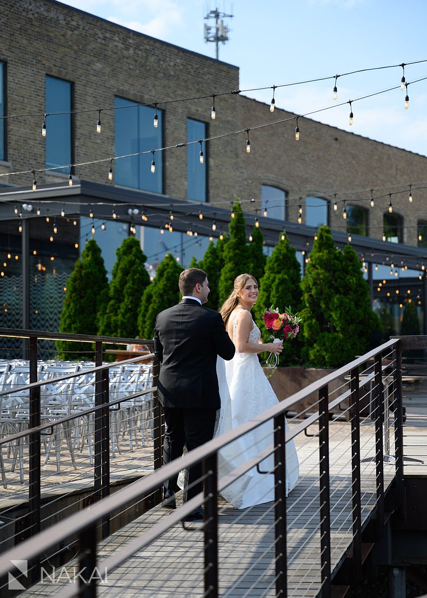 B&G on dock rockwell on the river wedding photos