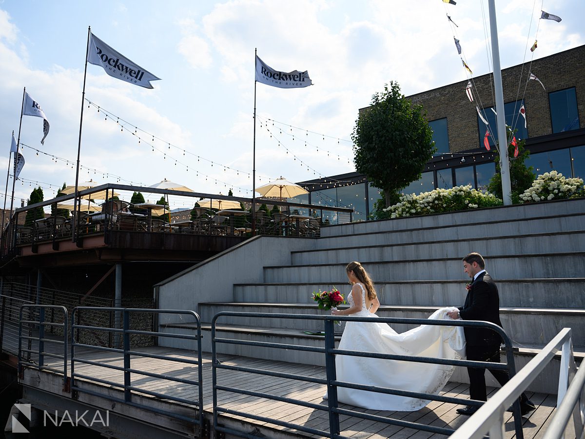B&G on dock rockwell on the river wedding pictures