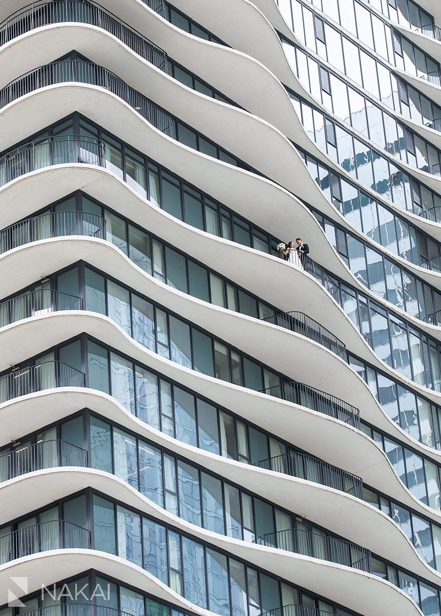 Radisson blu aqua hotel chicago wedding couple on balcony