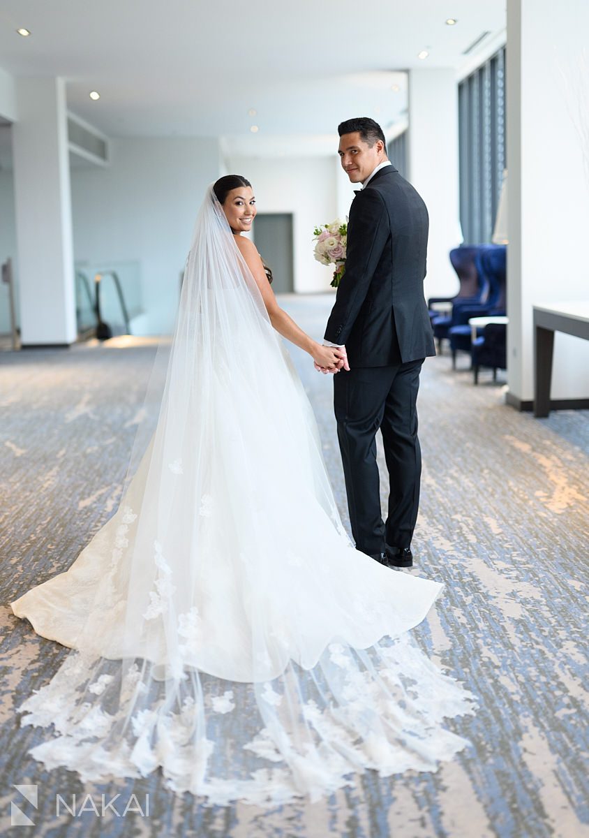 Radisson blu aqua hotel chicago wedding bride and groom walking