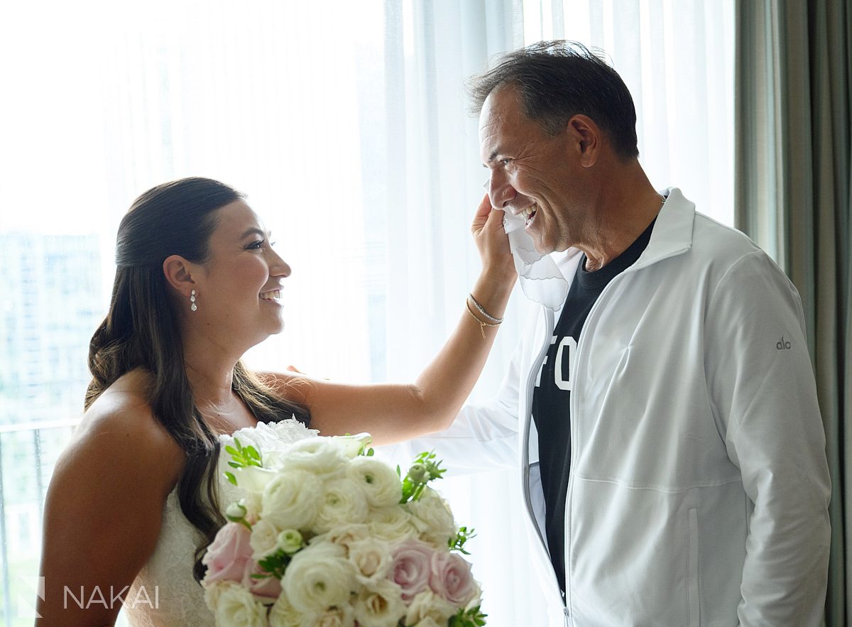 candids bride wiping dads tear Radisson blu aqua hotel chicago wedding 