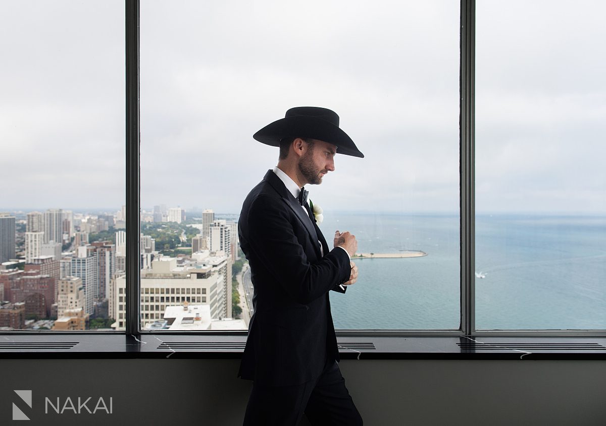 chicago groom overlooking lakefront, cowboy hat