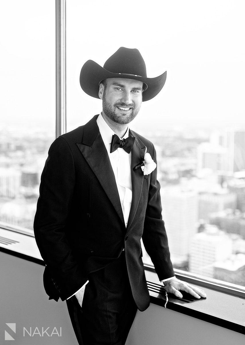 chicago groom overlooking city, cowboy hat