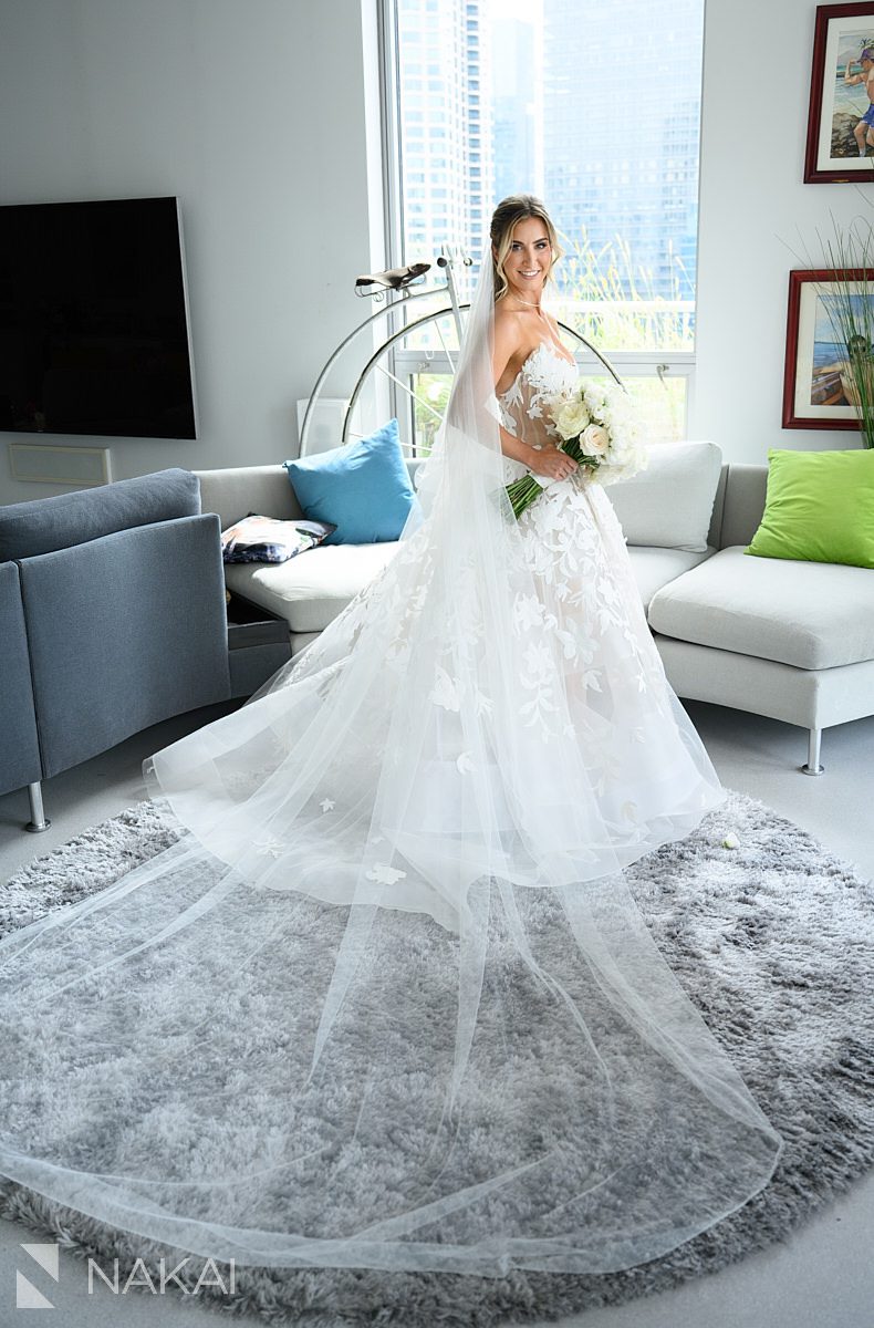 full length bride photo from the side with bouquet