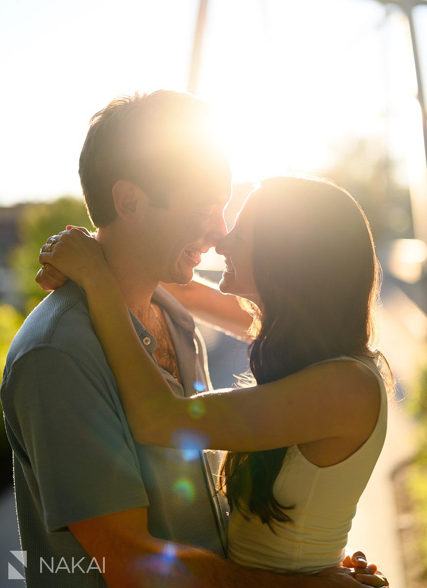 Chicago 606 engagement photos couple smiling with bridge in background