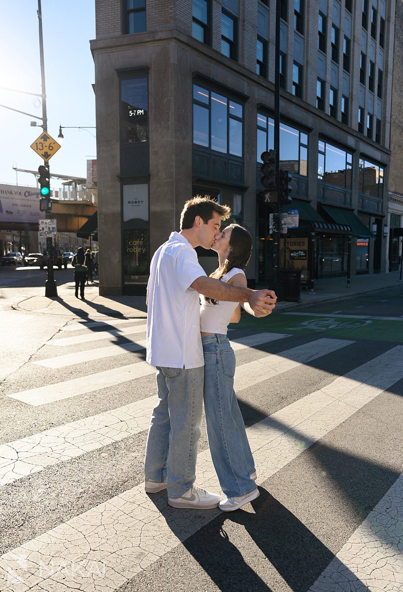 Chicago wicker park engagement photos couple kissing on street