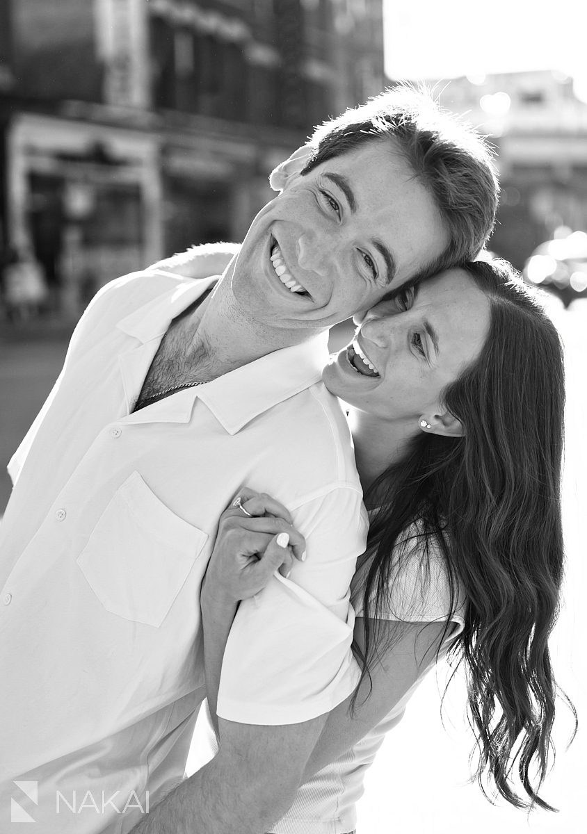 chicago street photography engagement photos black white laughing couple