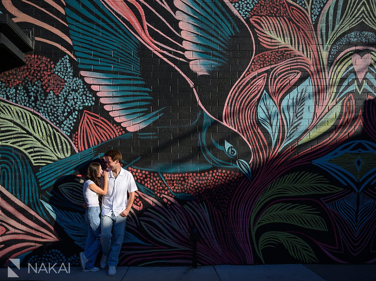 chicago urban art engagement photos in wicker park couple laughing