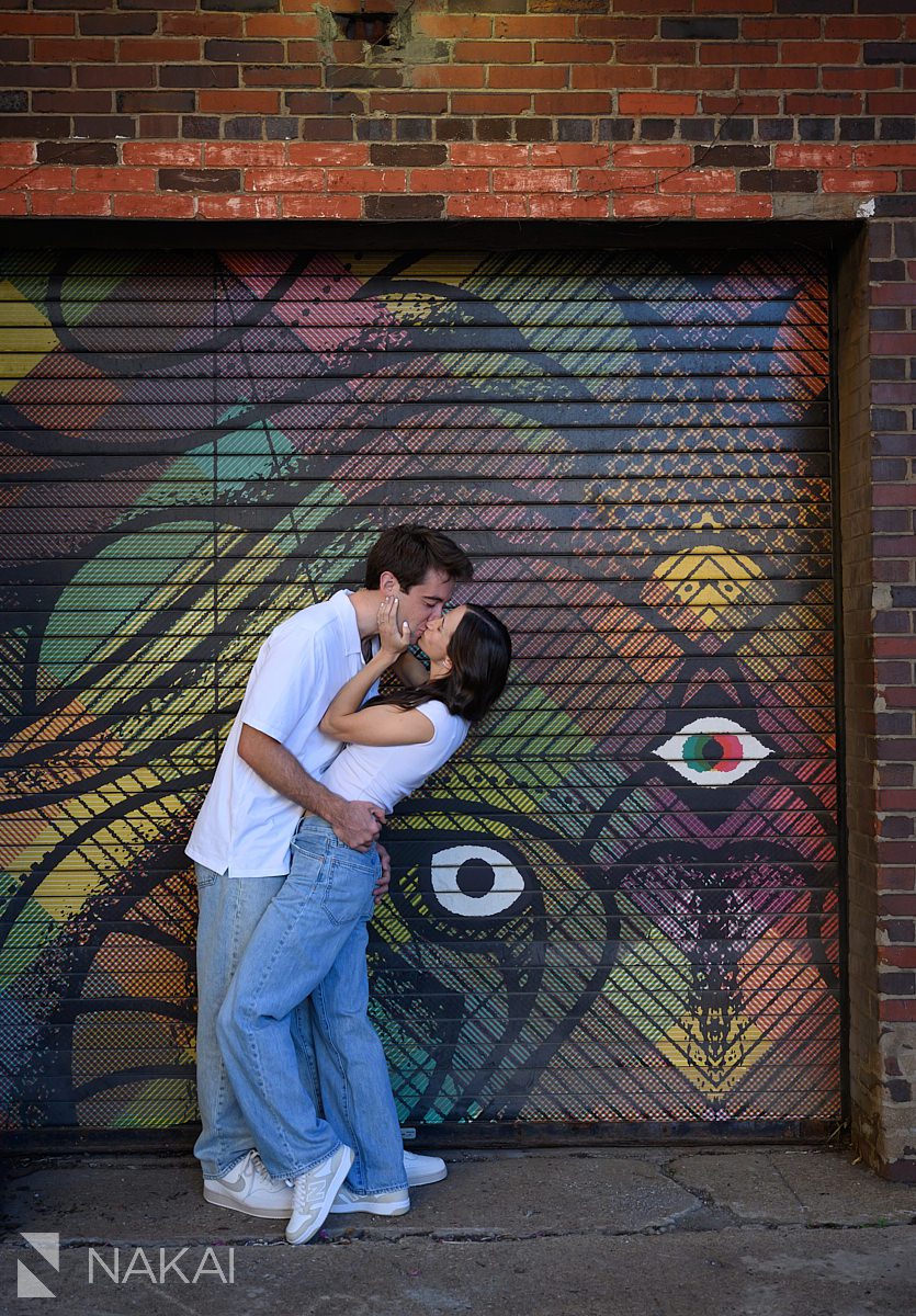 chicago urban art engagement photos in wicker park couple kissing
